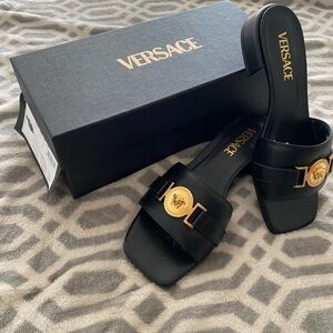 Versace Black Leather Slide Mules with Gold Medallion